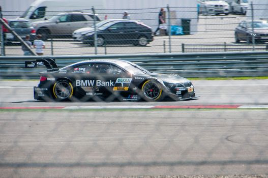 Bruno Spengler and him BMW M3 at DTM (Deutsche Tourenwagen Meisterschaft) on MRW (Moscow RaceWay), Moscow, Russia, 2013.08.04