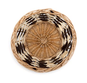Brown wicker basket top view isolated on white background