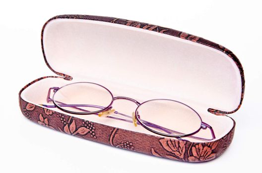 glasses in a case on a white background