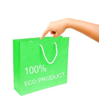 hand and blank green paper bag isolated on white background. 100% eco product