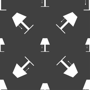 Lamp icon sign. Seamless pattern on a gray background. illustration