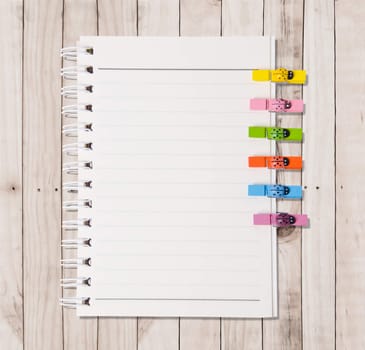 White Note Book Blank Page on Wood Table