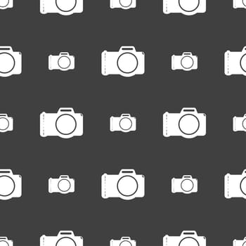 Photo camera sign icon. Digital photo camera symbol. Seamless pattern on a gray background. illustration