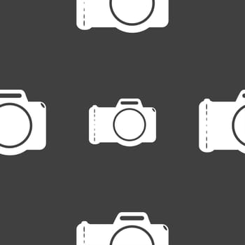 Photo camera sign icon. Digital photo camera symbol. Seamless pattern on a gray background. illustration