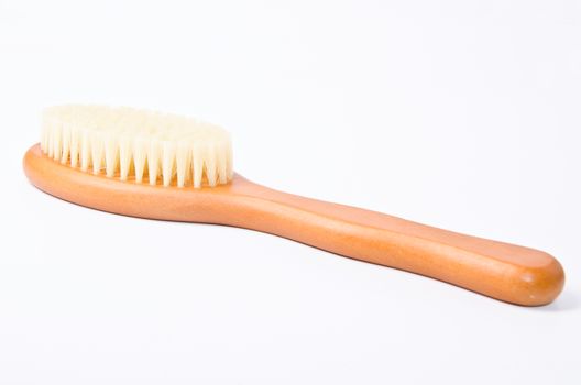 wooden soft body brush on white background