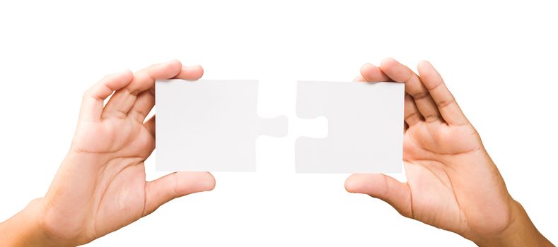 connection concept. hands with pieces of puzzle on white background, clipping path