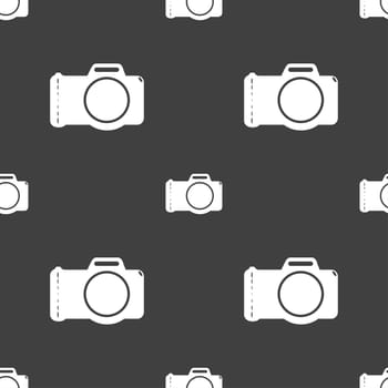 Photo camera sign icon. Digital photo camera symbol. Seamless pattern on a gray background. illustration