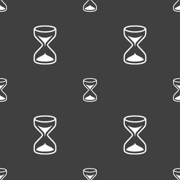 Hourglass sign icon. Sand timer symbol. Seamless pattern on a gray background. illustration