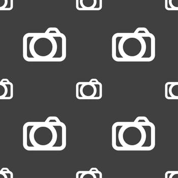 Photo camera sign icon. Digital photo camera symbol. Seamless pattern on a gray background. illustration