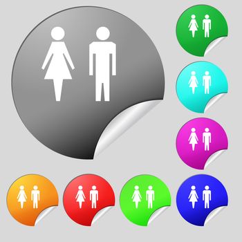 WC sign icon. Toilet symbol. Male and Female toilet. Set of eight multi colored round buttons, stickers. illustration