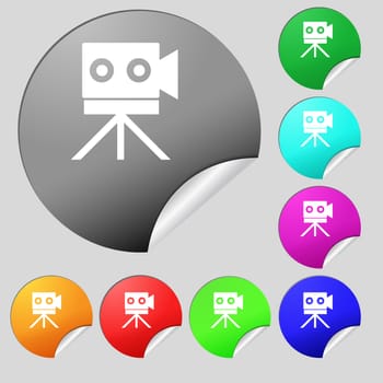 Video camera sign icon.content button. Set of eight multi colored round buttons, stickers. illustration
