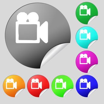 camcorder icon sign. Set of eight multi colored round buttons, stickers. illustration