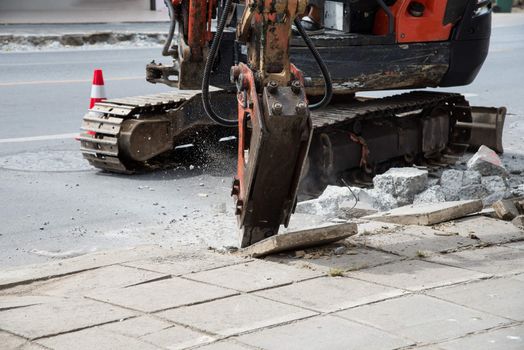 Car drills to repair roads