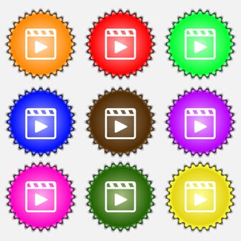 Play video icon sign. A set of nine different colored labels. illustration 