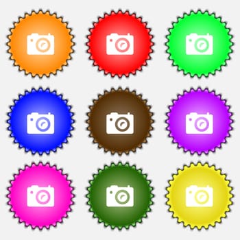 Digital photo camera icon sign. A set of nine different colored labels. illustration 