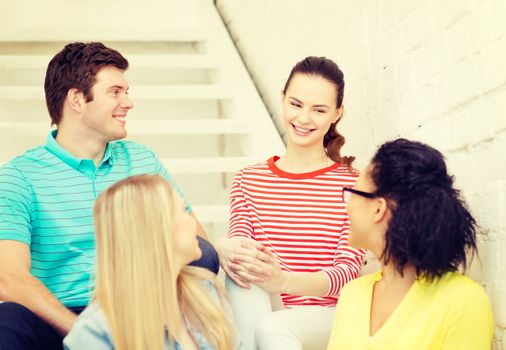 frienship and education concept - smiling teenagers hanging out