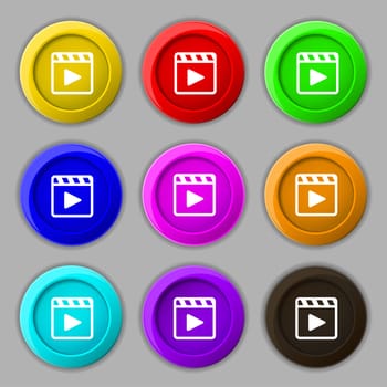 Play video icon sign. symbol on nine round colourful buttons. illustration