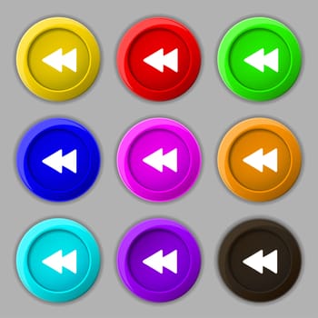 rewind icon sign. symbol on nine round colourful buttons. illustration