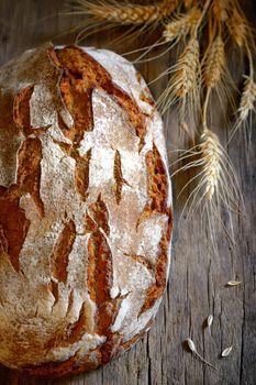 Fresh Home made Bread on old wooden table