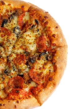 Half of Freshly Baked Pepperoni Pizza with Black Olives and Spices closeup on White background