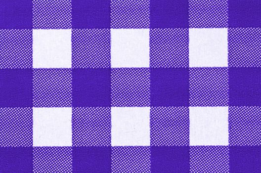 Background of Purple Checkered Glossy Paper closeup