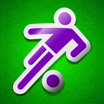 football player icon sign. Symbol chic colored sticky label on green background. illustration