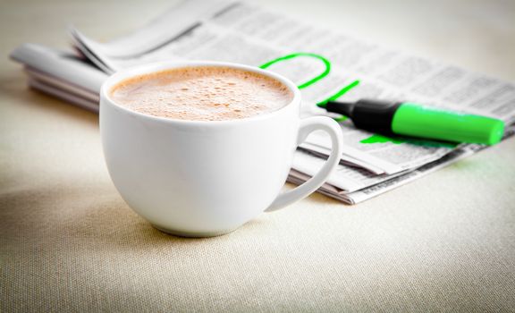 Morning coffee with newspaper