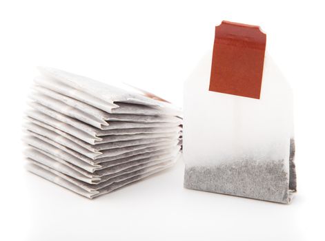 Close-up of tea bag isolated on white background