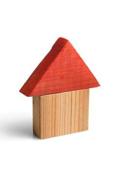 Wooden house model, symbol of real estate business.