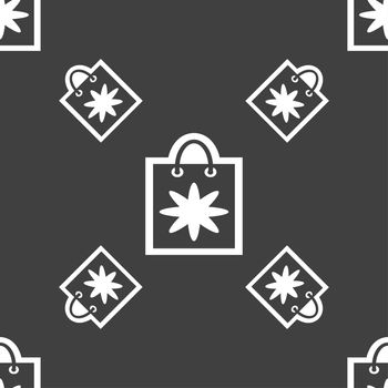 shopping bag icon sign. Seamless pattern on a gray background. illustration