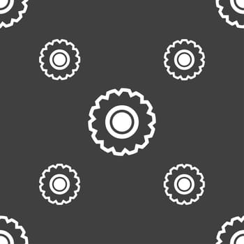 cogwheel icon sign. Seamless pattern on a gray background. illustration