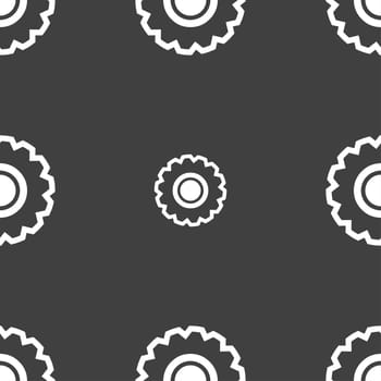 cogwheel icon sign. Seamless pattern on a gray background. illustration