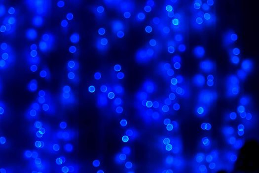 Blue glitter bokeh lights bokeh defocused background