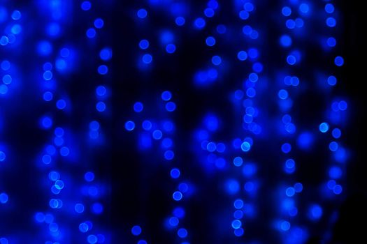Blue glitter bokeh lights bokeh defocused background
