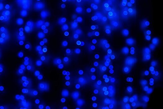 Blue glitter bokeh lights bokeh defocused background