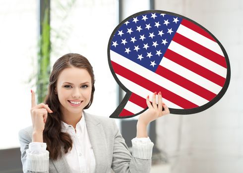 education, foreign language, english, people and communication concept - smiling woman holding text bubble of american flag