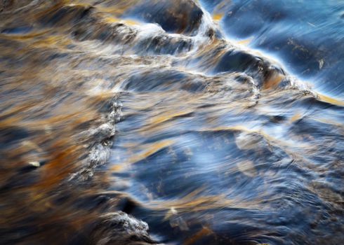 abstract background late evening river level with ripples