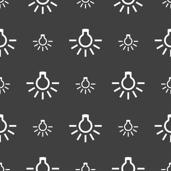 light bulb icon sign. Seamless pattern on a gray background. illustration