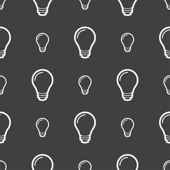 Light bulb icon sign. Seamless pattern on a gray background. illustration