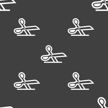 scissors icon sign. Seamless pattern on a gray background. illustration