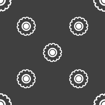 cogwheel icon sign. Seamless pattern on a gray background. illustration