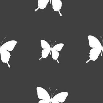 butterfly icon sign. Seamless pattern on a gray background. illustration