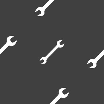 wrench icon sign. Seamless pattern on a gray background. illustration