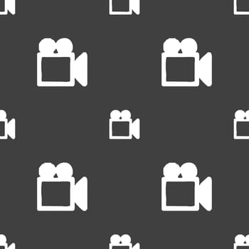 camcorder icon sign. Seamless pattern on a gray background. illustration