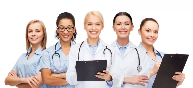 healthcare and medicine concept - smiling female doctors and nurses with stethoscope