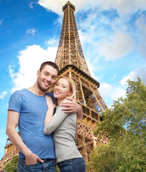 love and family concept - smiling couple hugging