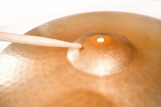 Drum conceptual image. Picture of cymbal and stick.