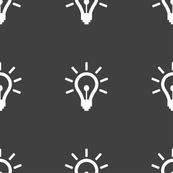 Light bulb icon sign. Seamless pattern on a gray background. illustration