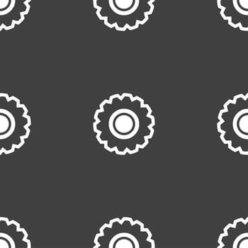 cogwheel icon sign. Seamless pattern on a gray background. illustration