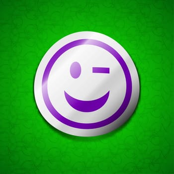 Winking Face icon sign. Symbol chic colored sticky label on green background. illustration